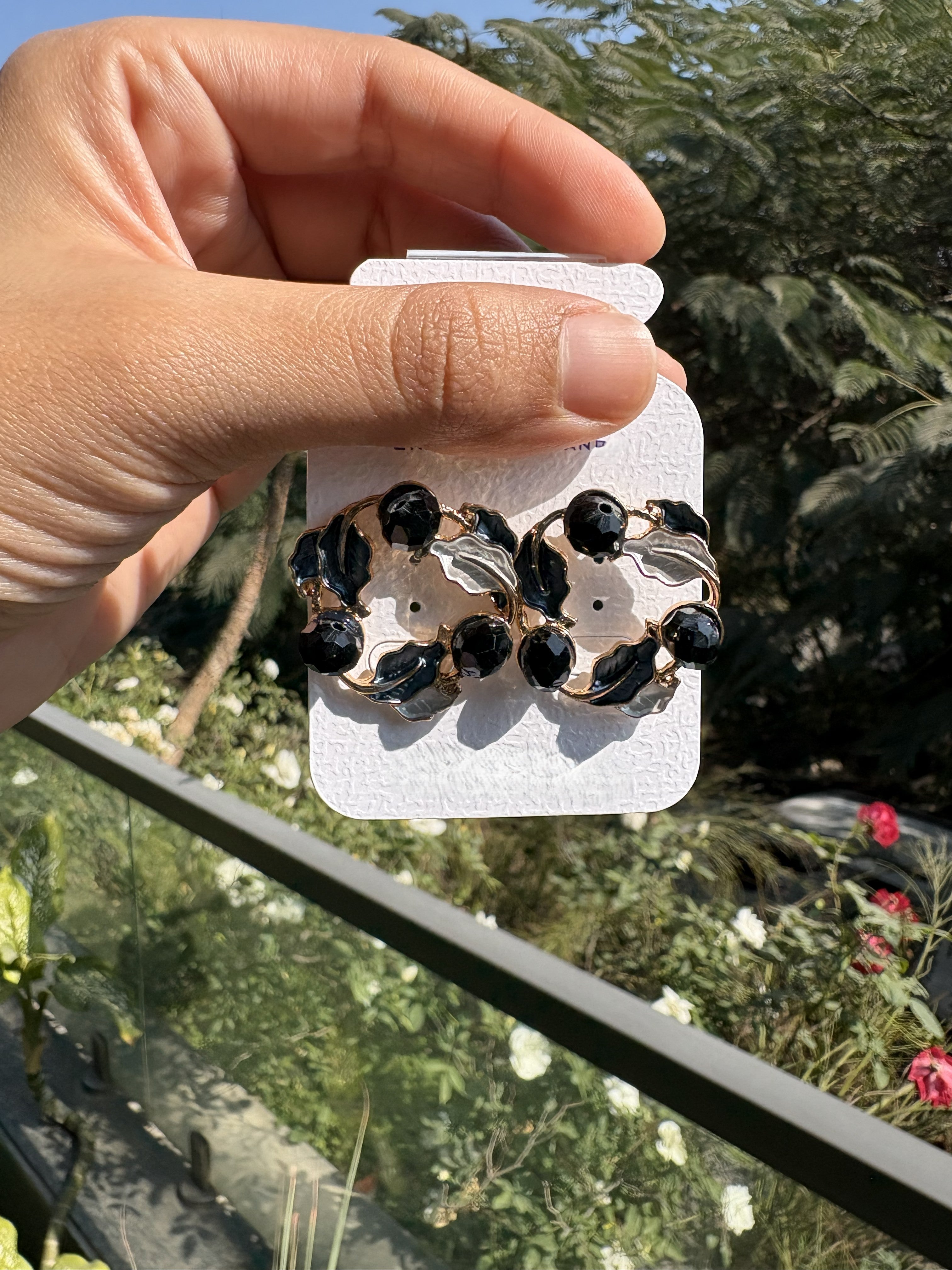 Stone Studded Leafy Round Earrings | Black